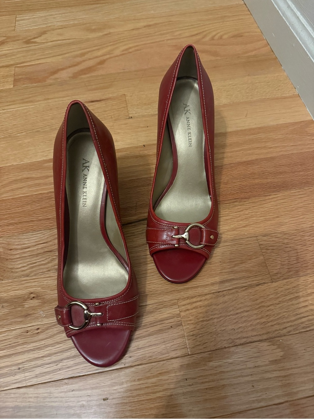 Anne Klein Red Leather Peep-Toe Pumps with Gold Buckle Accent
